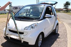 Smart car with smart tow system for behind a motor home