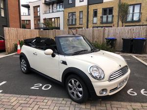 Mini Cooper convertible , low miles, lots of Extras in