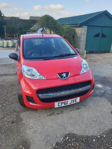 Red Peugeot , Excellent condition, 54k miles,