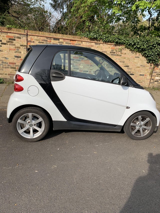 White  Smart Car