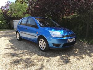 Ford Fiesta 1.4 lx 5dr with a/c and climate pack.low