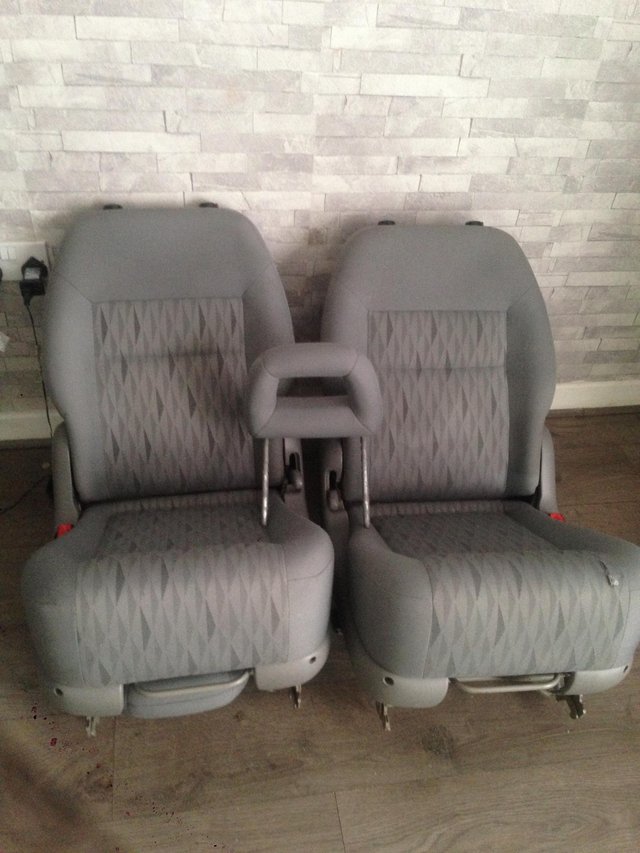 Two ford galaxy seats and one head rest
