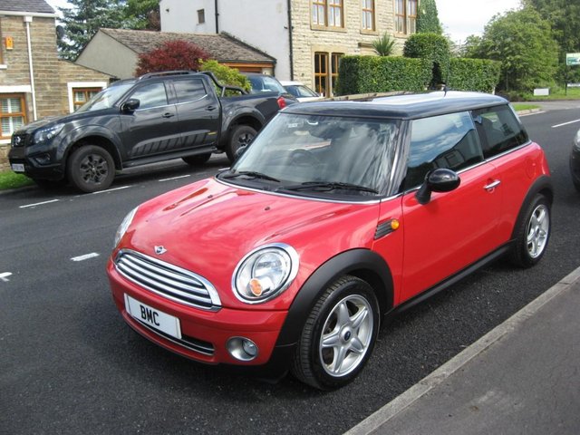 -reg Mini 1.6 Cooper Hatch manual finished in red and