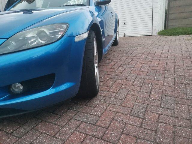 Mazda rx 8 in blue ]