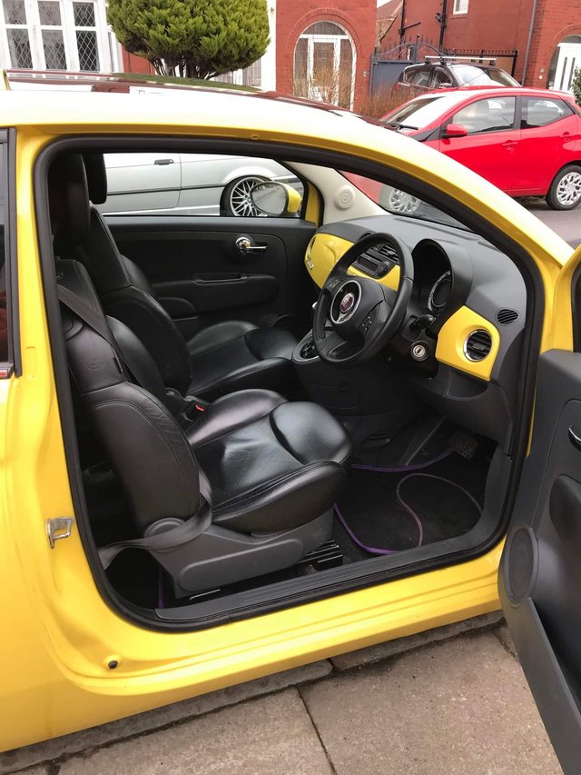 Yellow Fiat 500 Automatic. 0.9L
