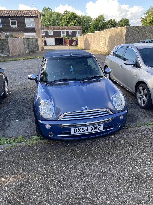 Mini Cooper convertible in jeans blue soft top