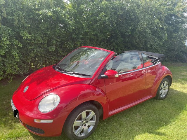 VW Beetle convertible  in red
