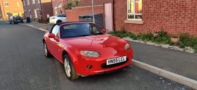 For sale red sport Mazda MX5 convertible