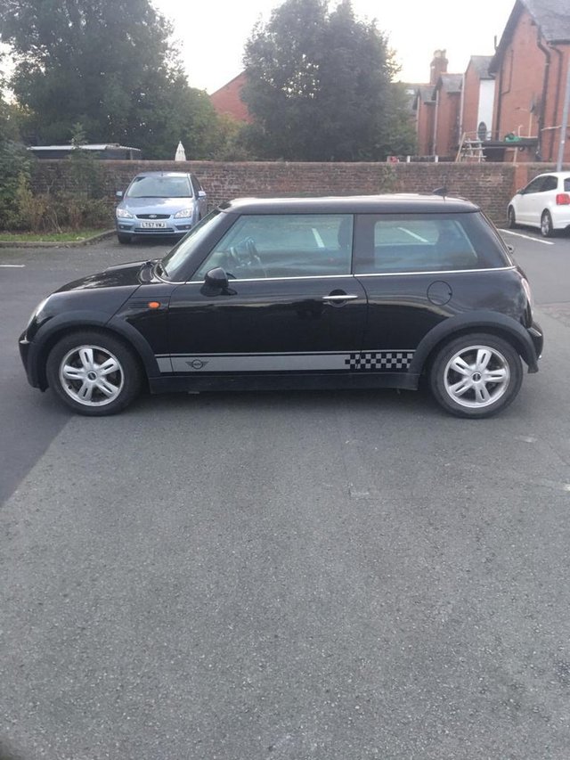  Black Mini Cooper in fair condition