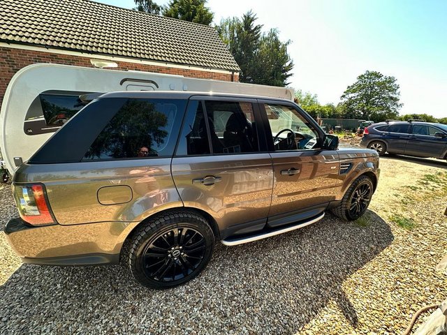  Range Rover sport in gold with heavy duty tow bar